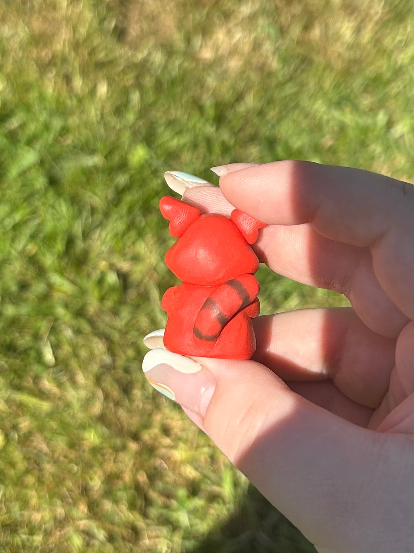 Red panda worry sculpture