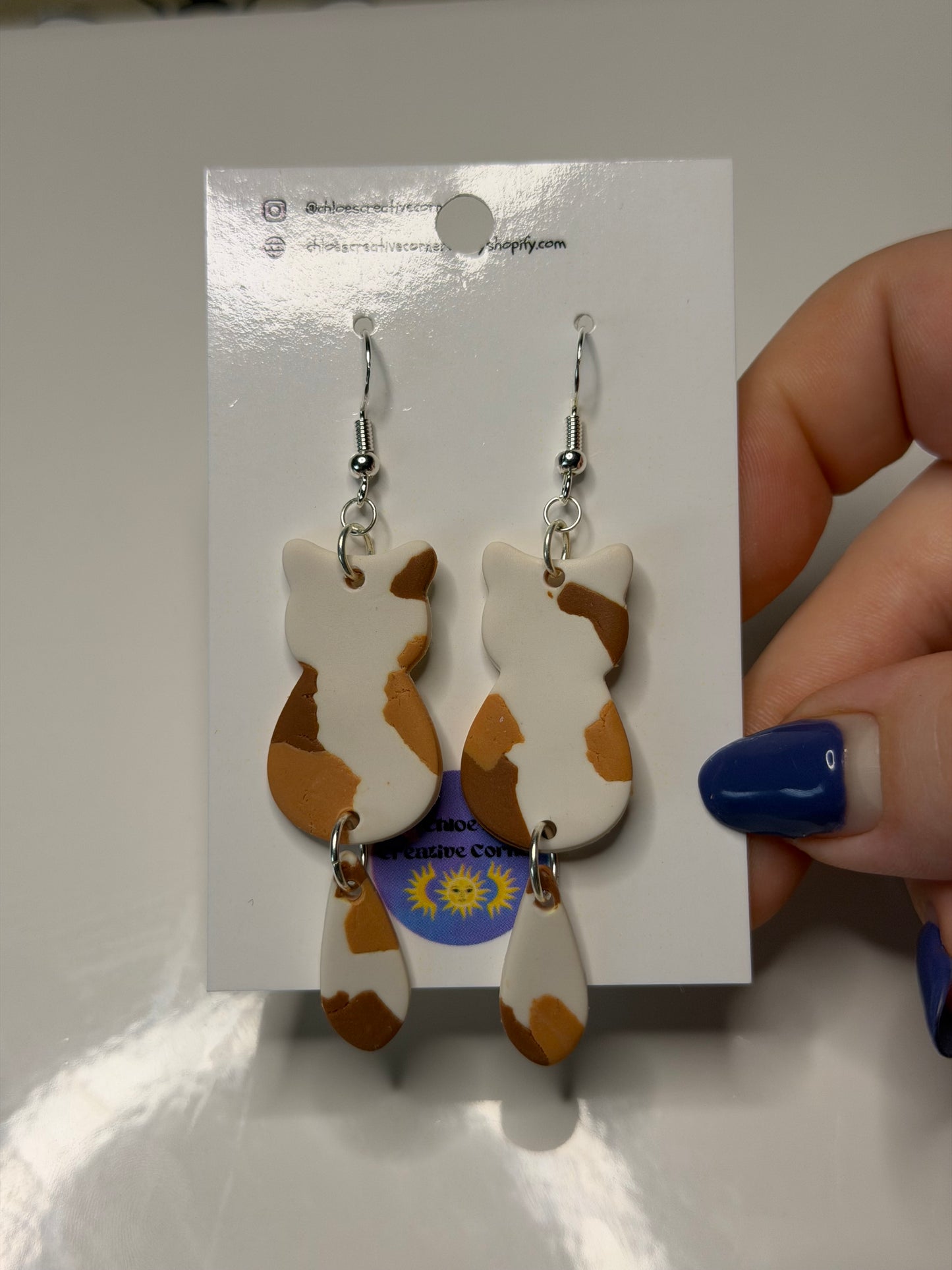 Calico cat silhouette earrings 