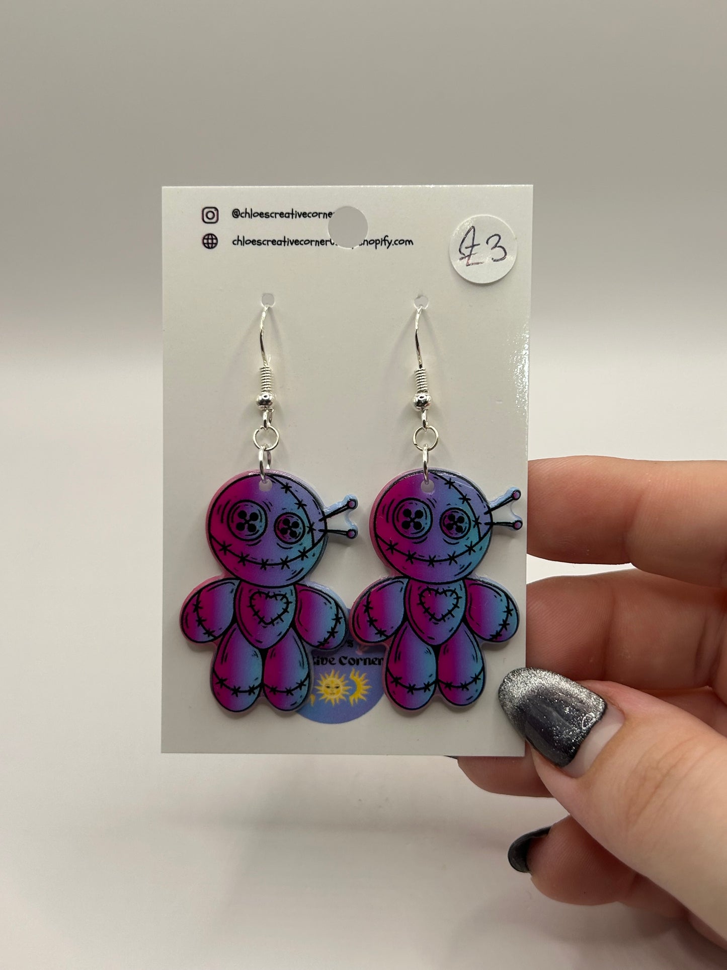 Voodoo doll earrings