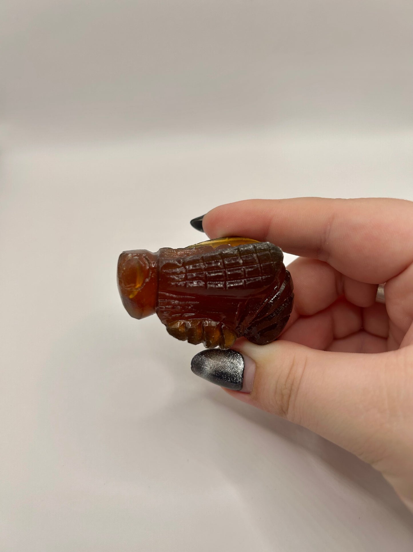 Amber bee carving