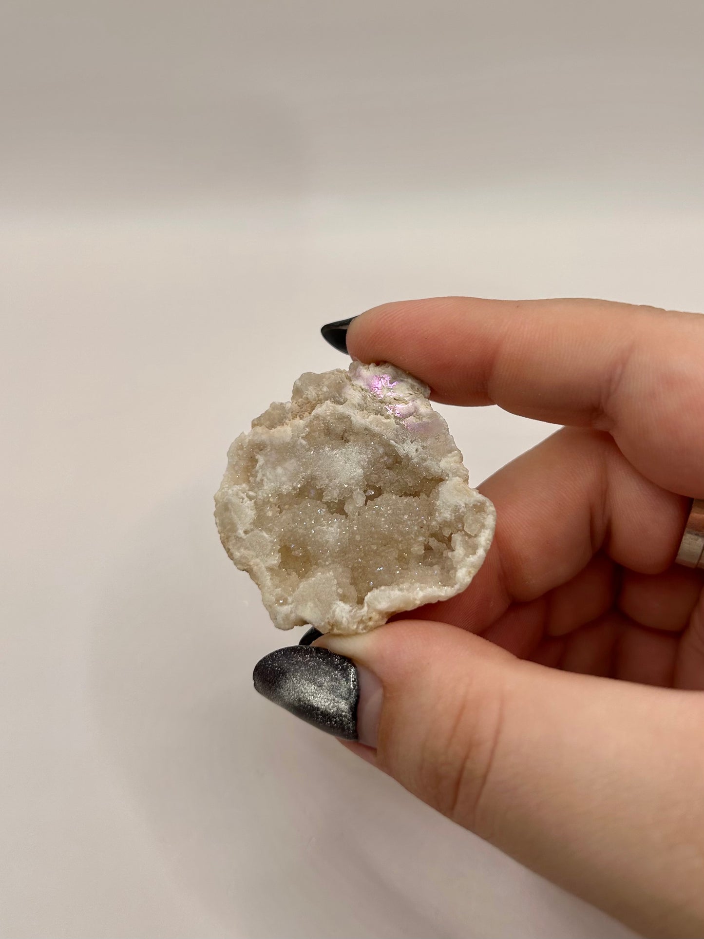 Aura coated quartz geode