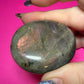 Purple labradorite palmstone