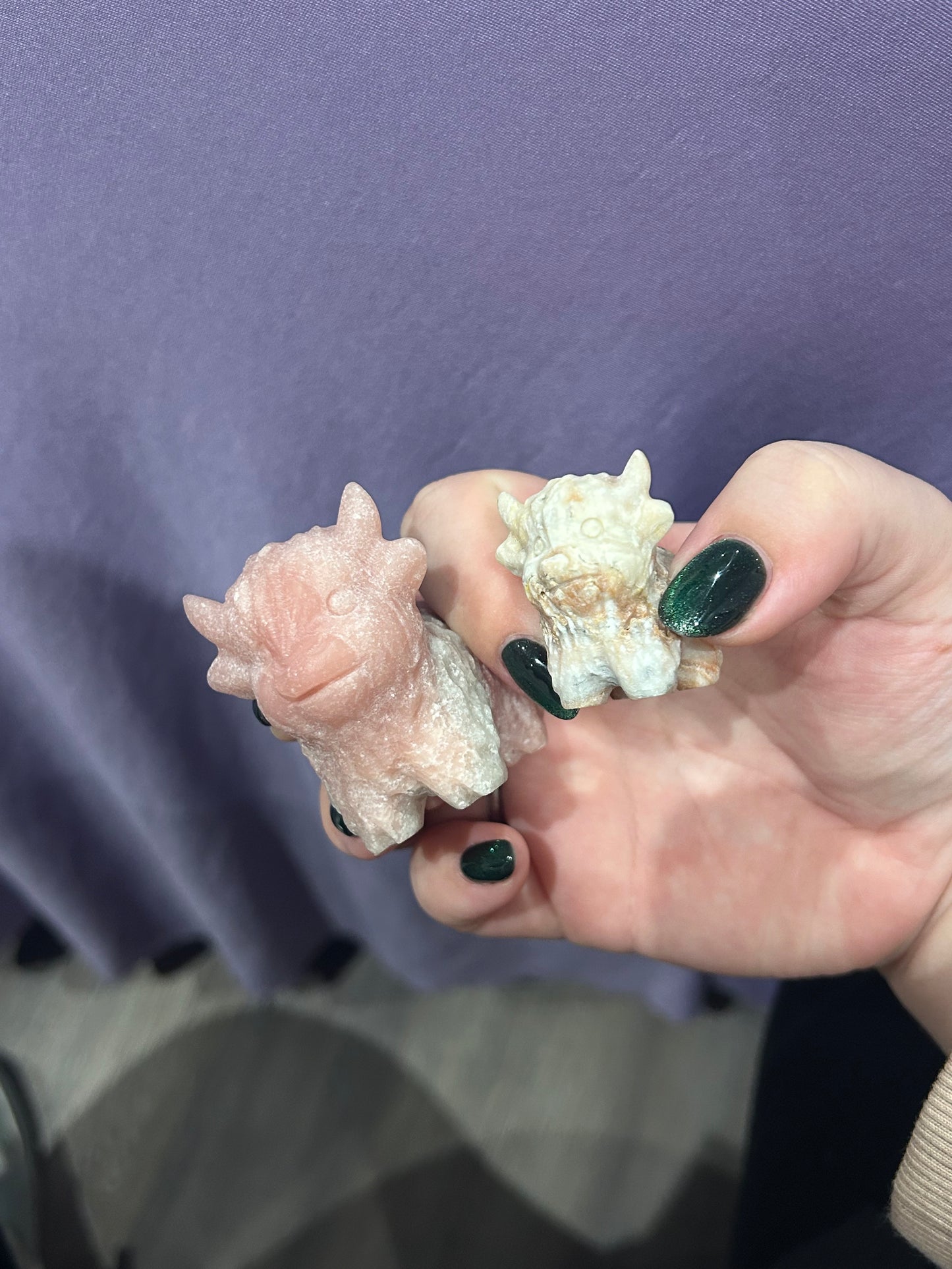 Pink opal highland cow carvings