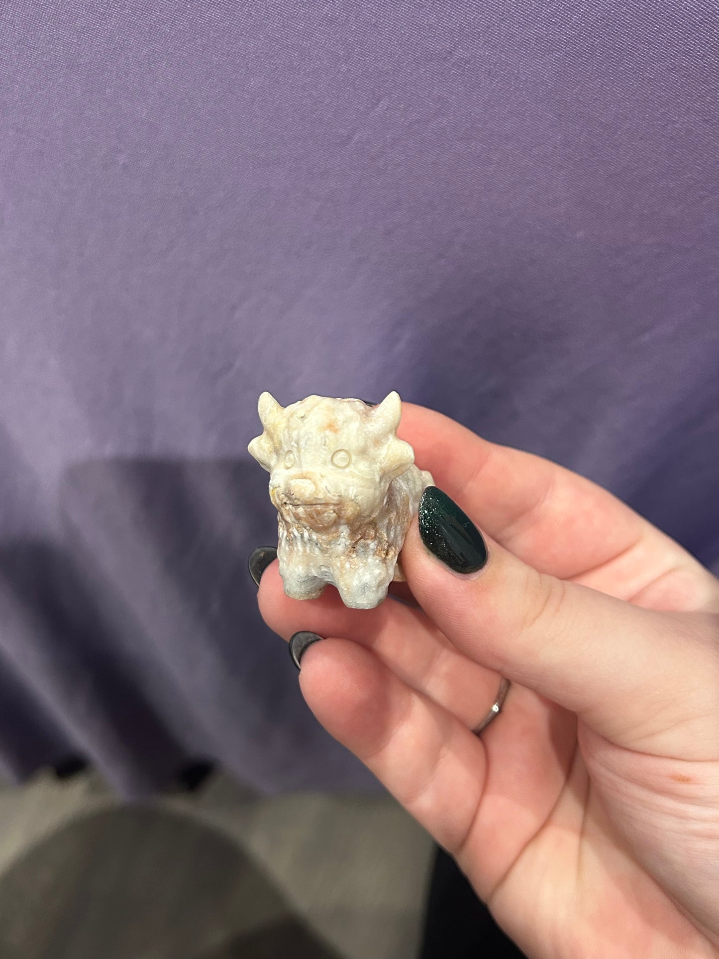 Pink opal highland cow carvings