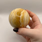 Orange calcite sphere
