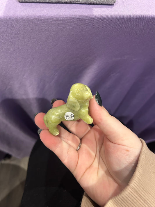 Serpentine dog carving