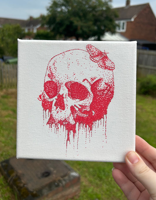 Pointillism skull canvas