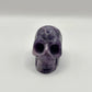Lepidolite skull carving