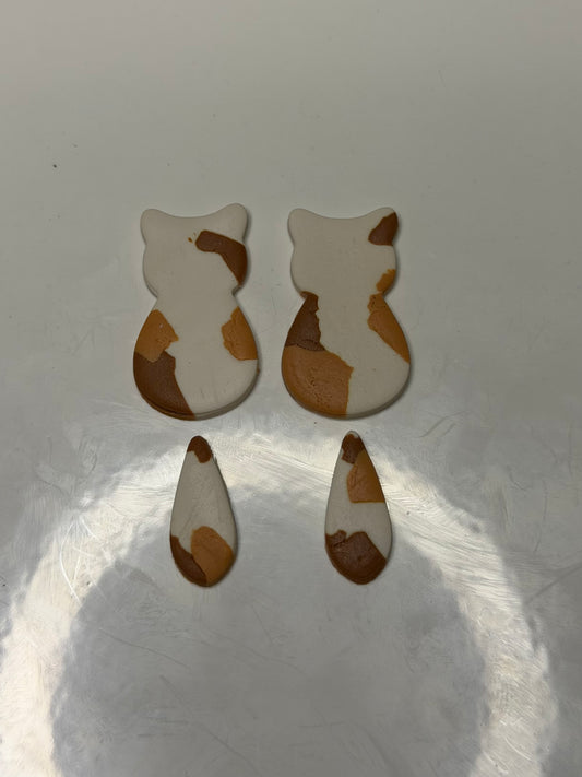 Calico cat silhouette earrings ￼