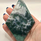 Moss agate diamond on stand