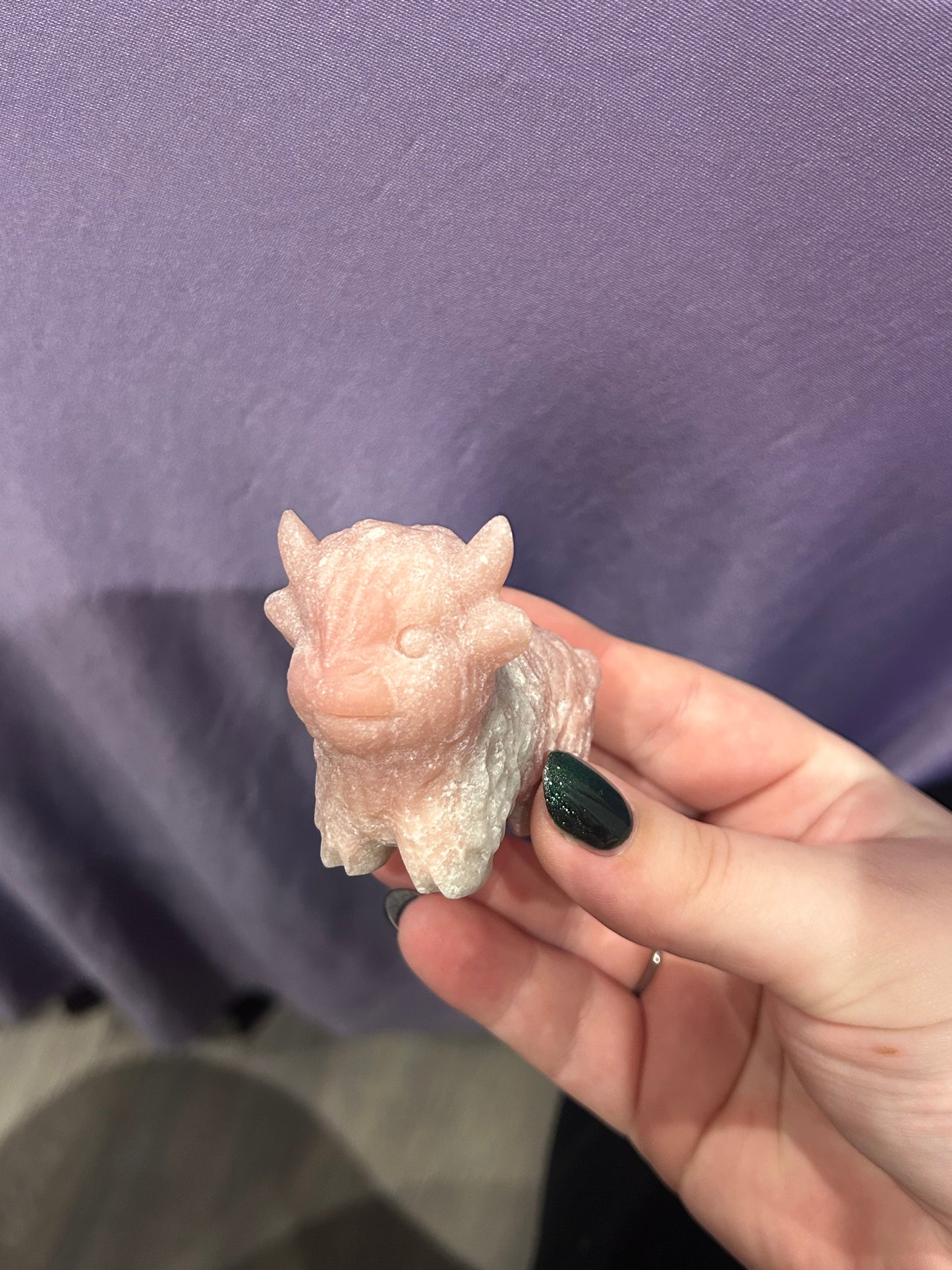 Pink opal highland cow carvings