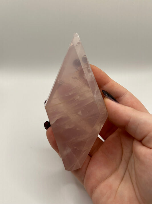 Imperfect rose quartz diamond