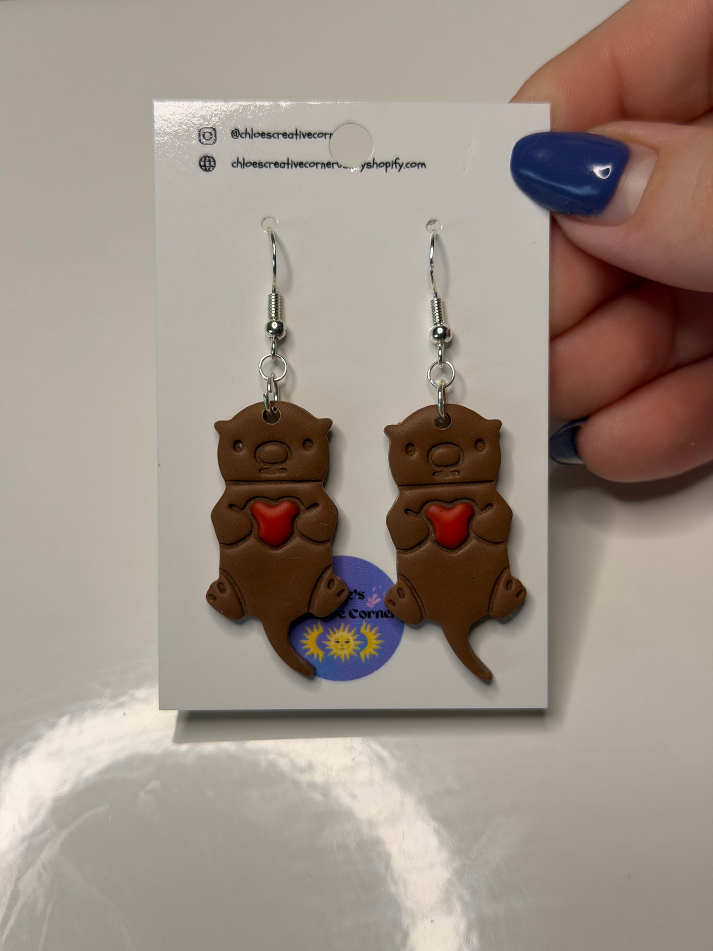 Otter earrings