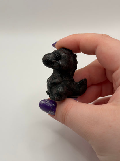Dinosaur carvings