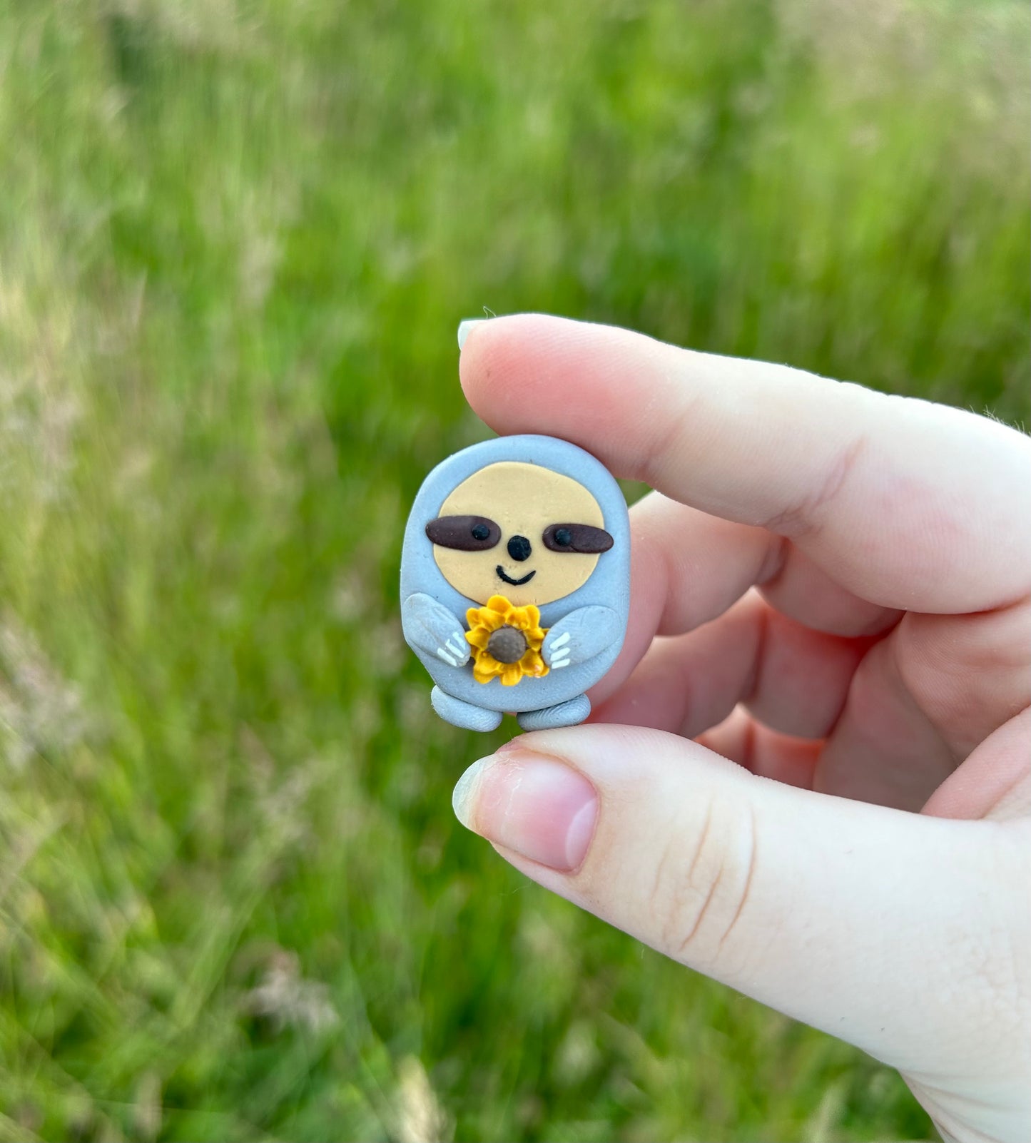 Sloth sunflower sculpture