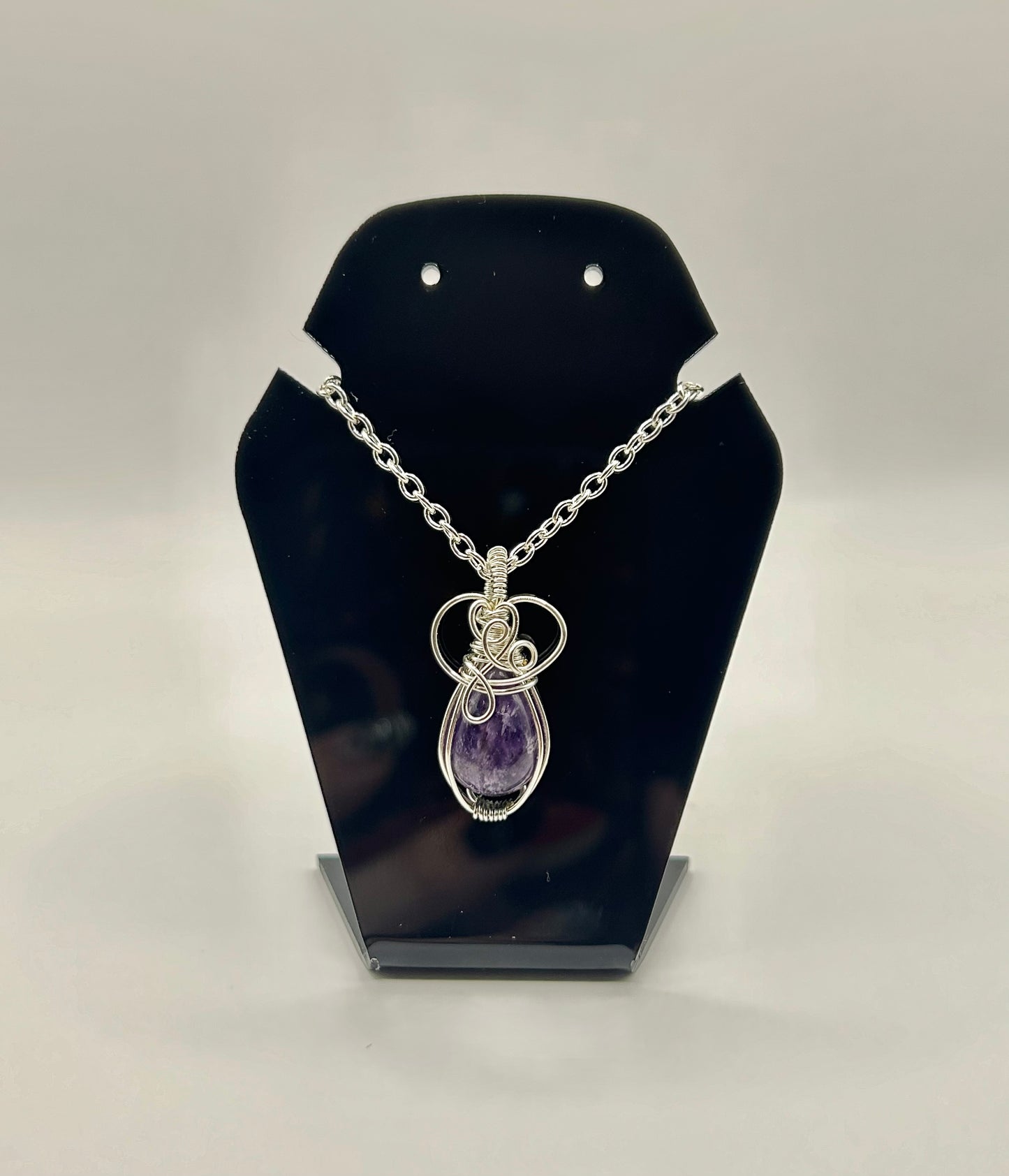 Feathered fluorite pendant