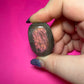 Pink small labradorite palmstone