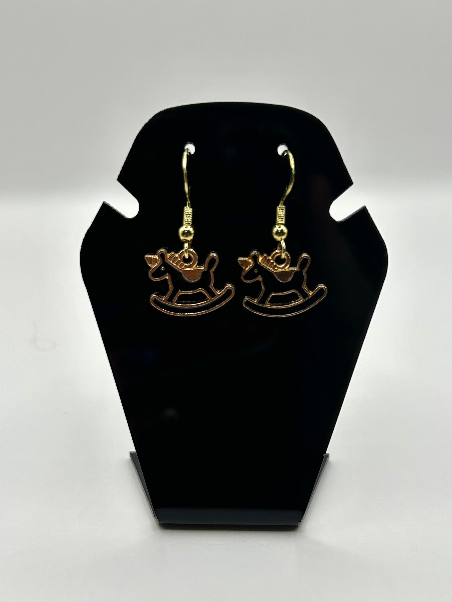 Black rocking horse earrings