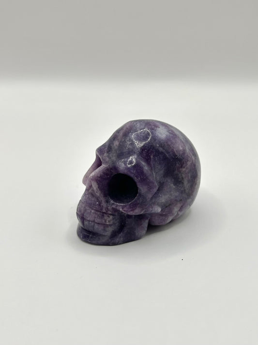 Lepidolite skull carving