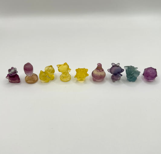 Pokémon fluorite carvings