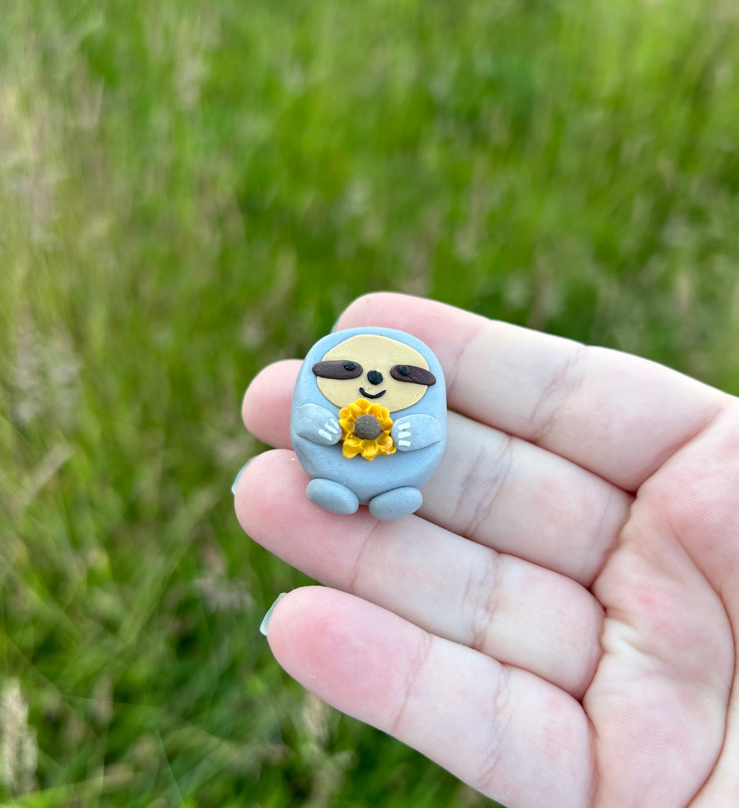 Sloth sunflower sculpture