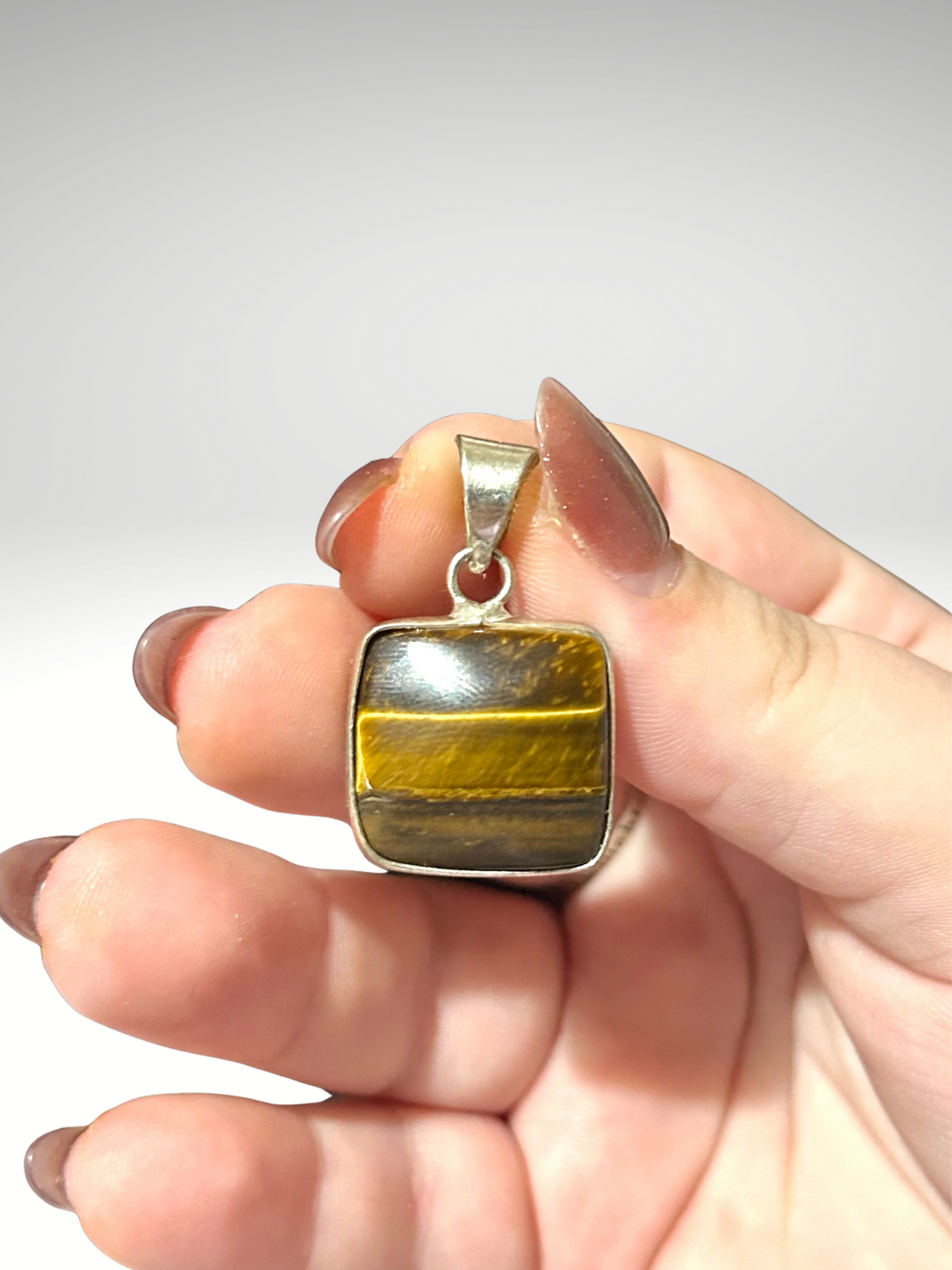 Sterling silver tigers eye pendant