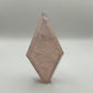 Imperfect rose quartz diamond