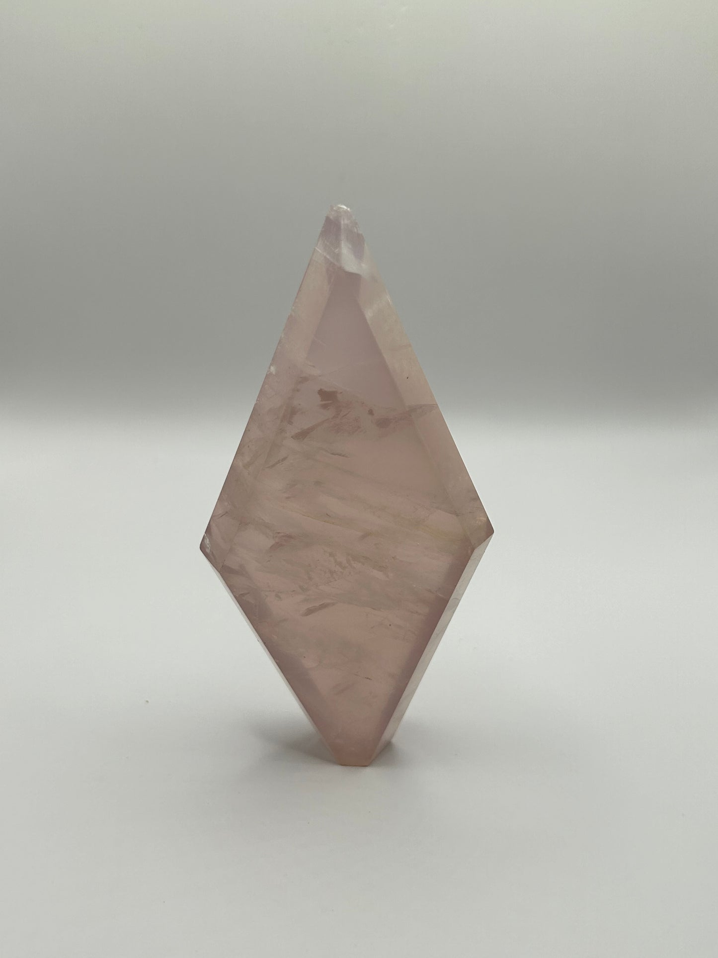 Imperfect rose quartz diamond