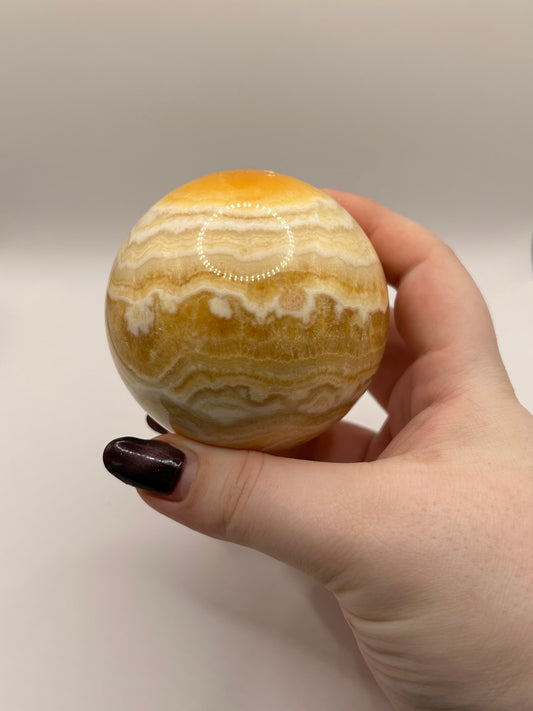 Orange calcite sphere