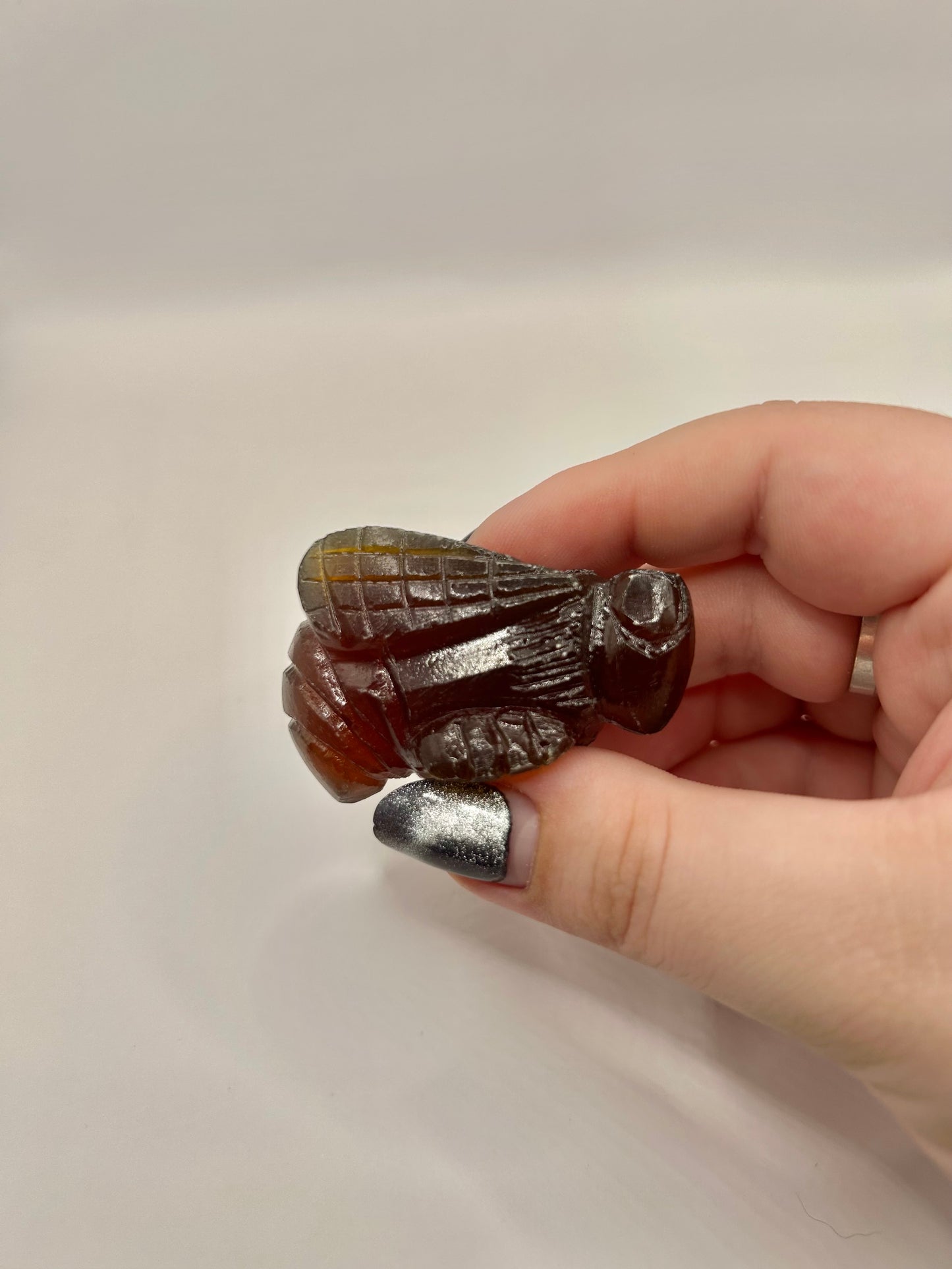 Amber bee carving